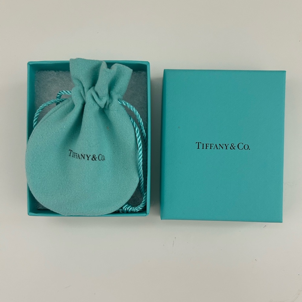 Original Tiffany & Co. box and jewelry bag. No jewelry included.